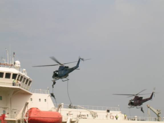 Photo of the HRT Fast Roping During an Exercise