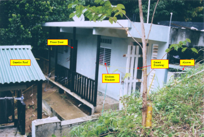 Figure 9 (Photo of residence from approximate position of shooter). Important features are labeled.